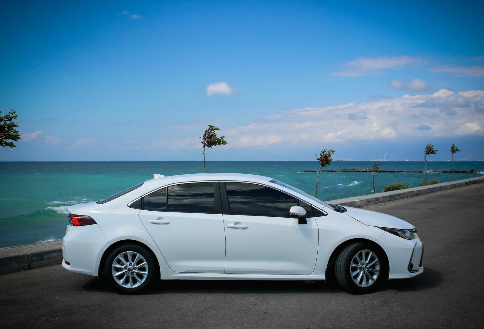 White Toyota Corolla available for weekly rideshare rental in Melbourne